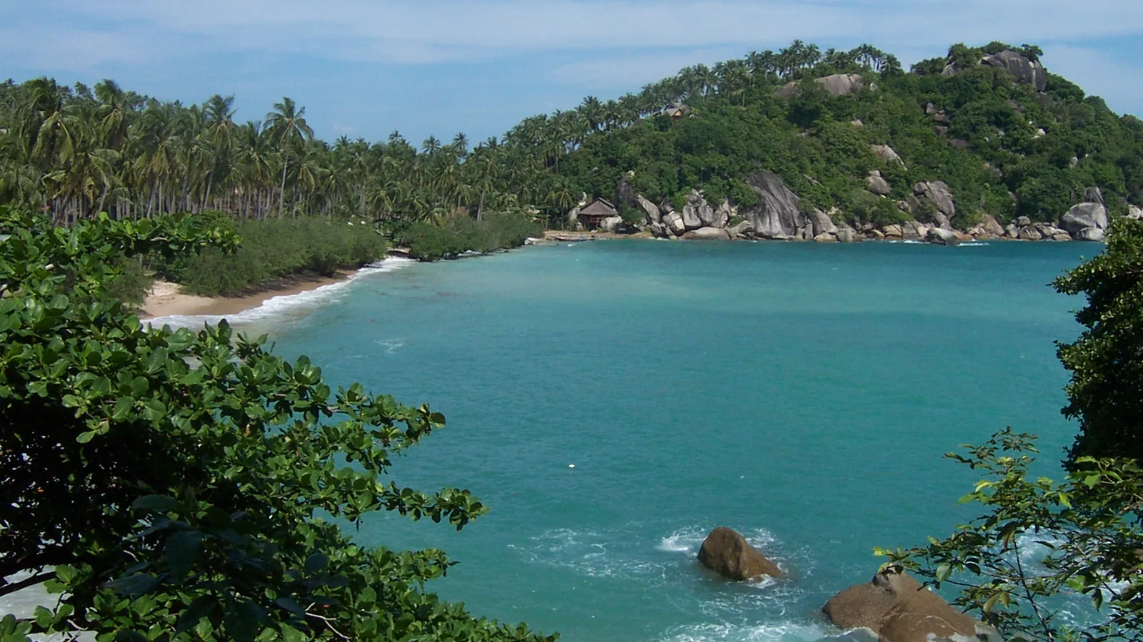 Haad Tien bay on the eastern coast of Koh Phangan, seen from the trees above the beach